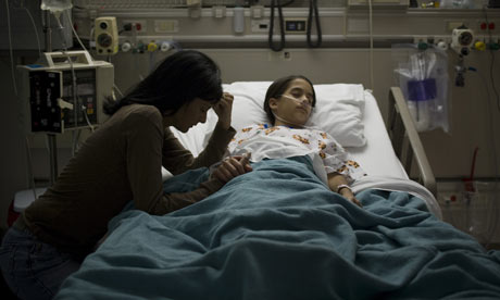 A-mother-with-a-sick-chil-001